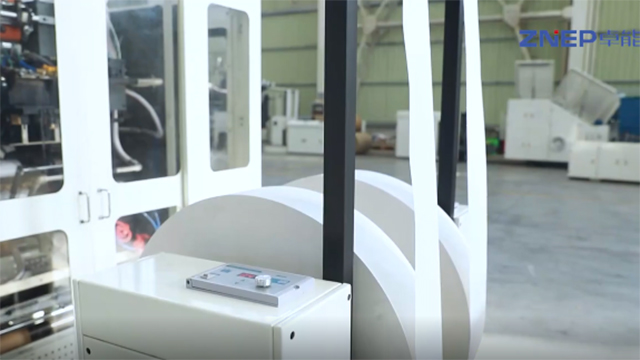 Máquina para bolsa con asa plana plegada